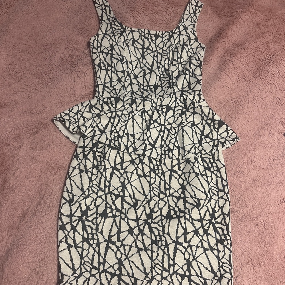 Black and White Sleeveless Peplum Mini Dress